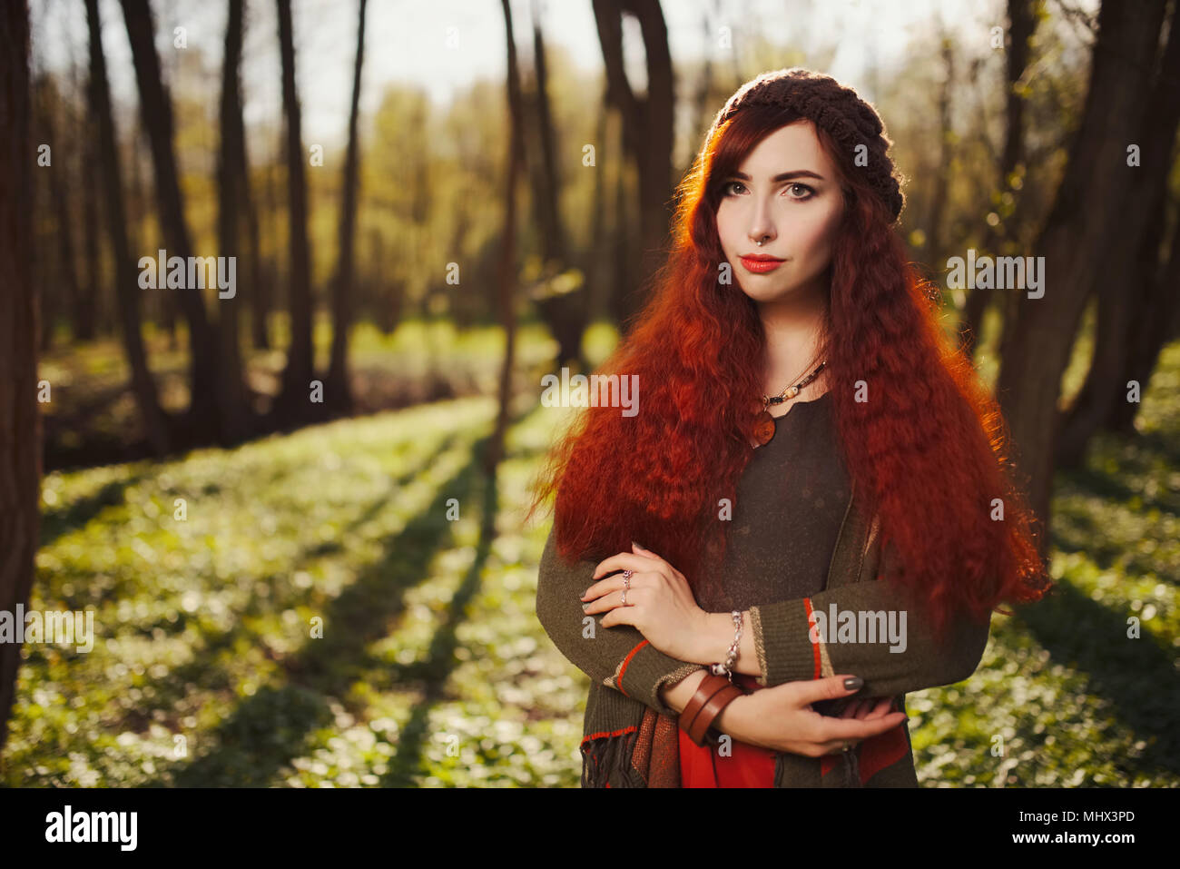 red haired girl in the forest Stock Photo - Alamy