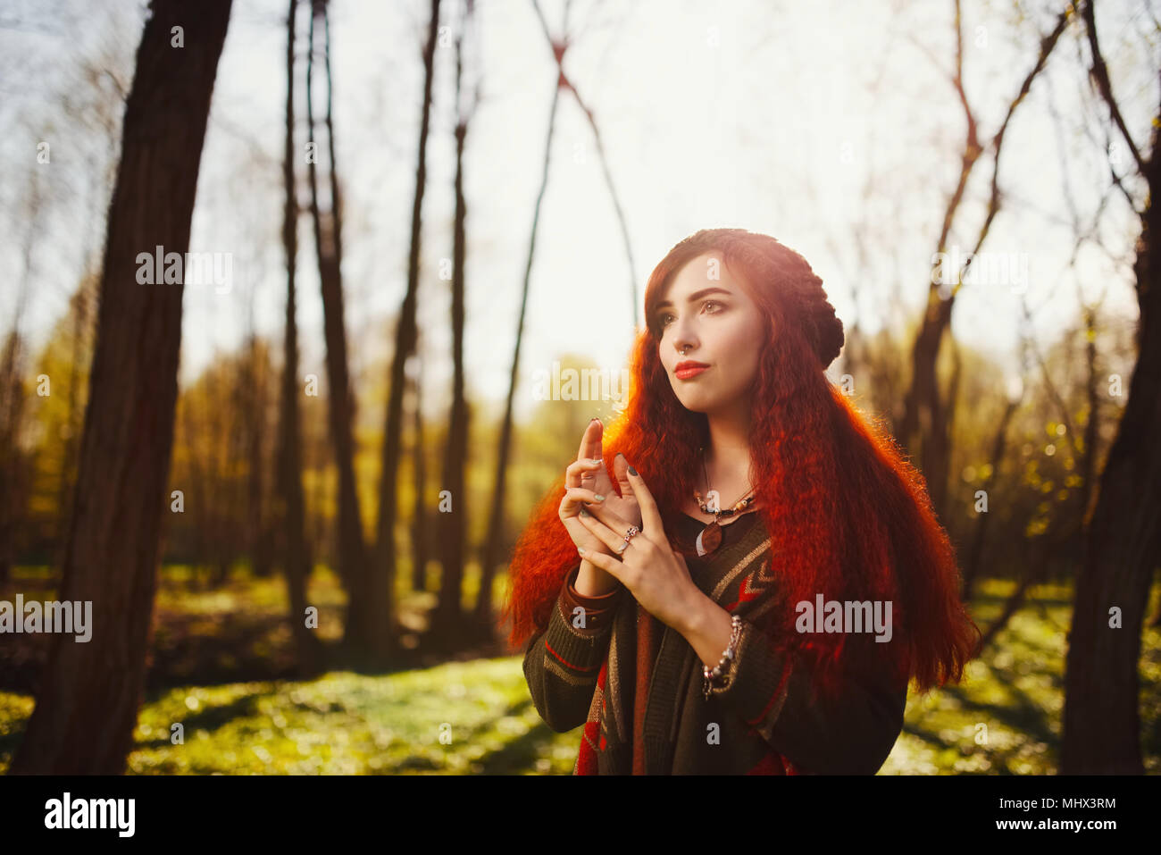 red haired girl in the forest Stock Photo - Alamy