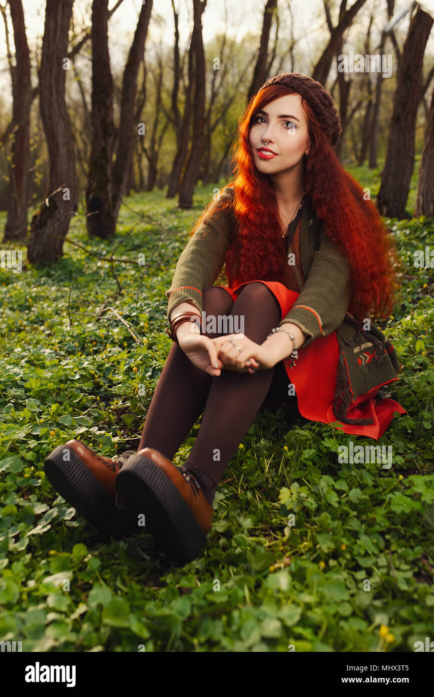 red haired girl in the forest Stock Photo - Alamy
