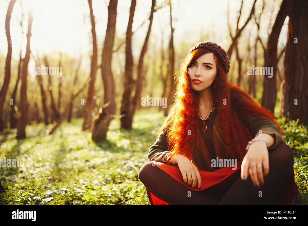 red haired girl in the forest Stock Photo - Alamy