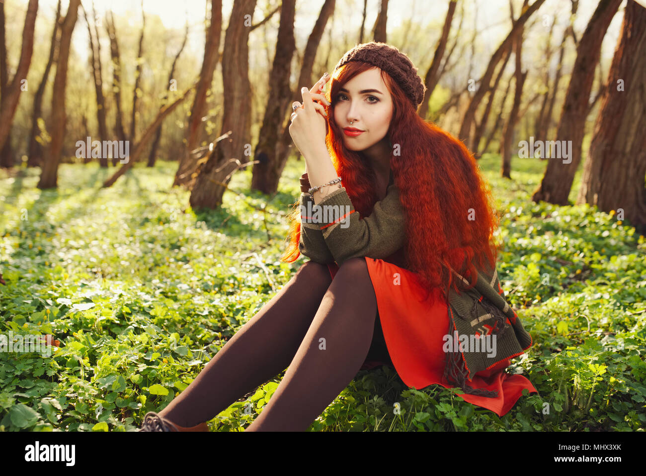 red haired girl in the forest Stock Photo - Alamy