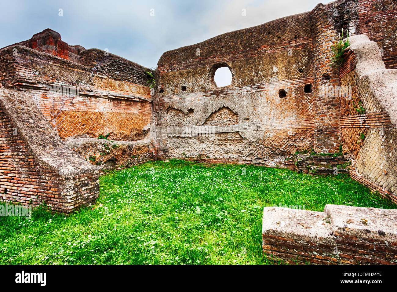Glimpse of the archaeological Roman empire ruins view in Ostia Antica - Rome - Italy Stock Photo