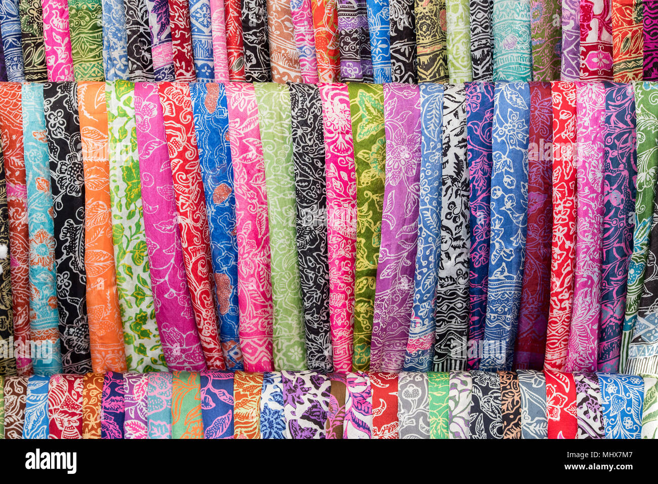 Batik indonesian silk cotton fabric tissue for sale on display at the market Stock Photo