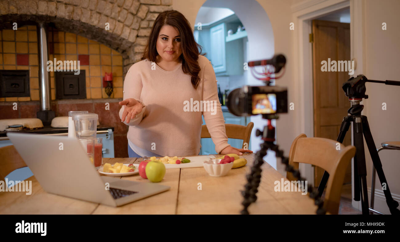Female video blogger recording video vlog Stock Photo