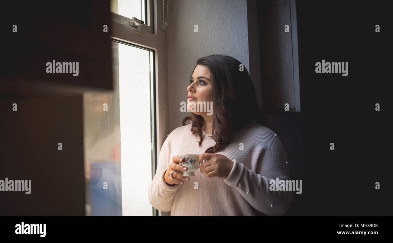 Beautiful female having coffee Stock Photo