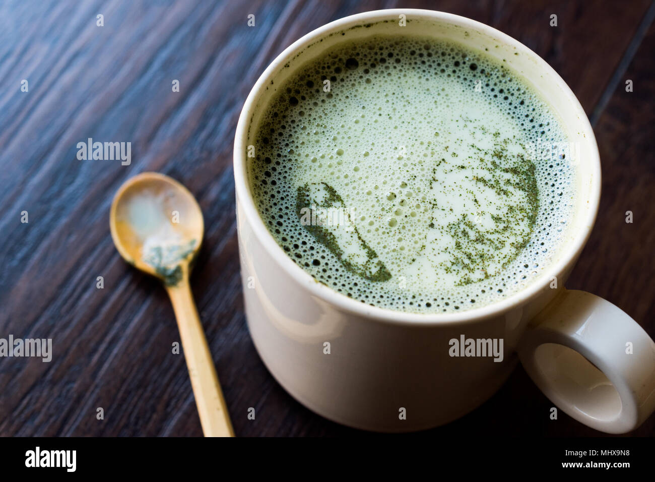 https://c8.alamy.com/comp/MHX9N8/hot-matcha-tea-latte-with-milk-organic-beverage-MHX9N8.jpg