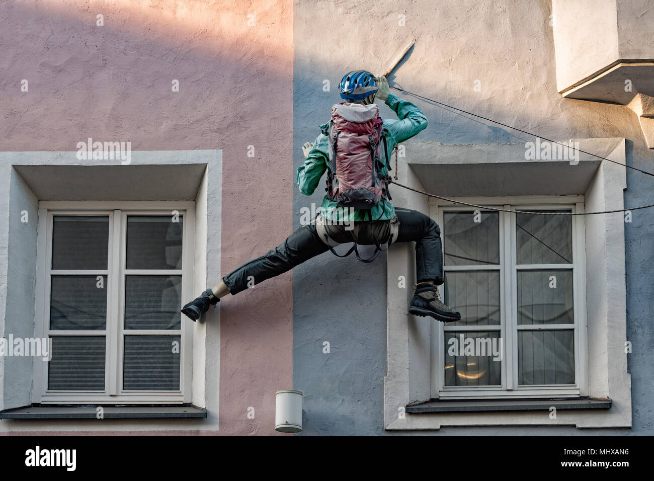 climber puppet on a building Stock Photo
