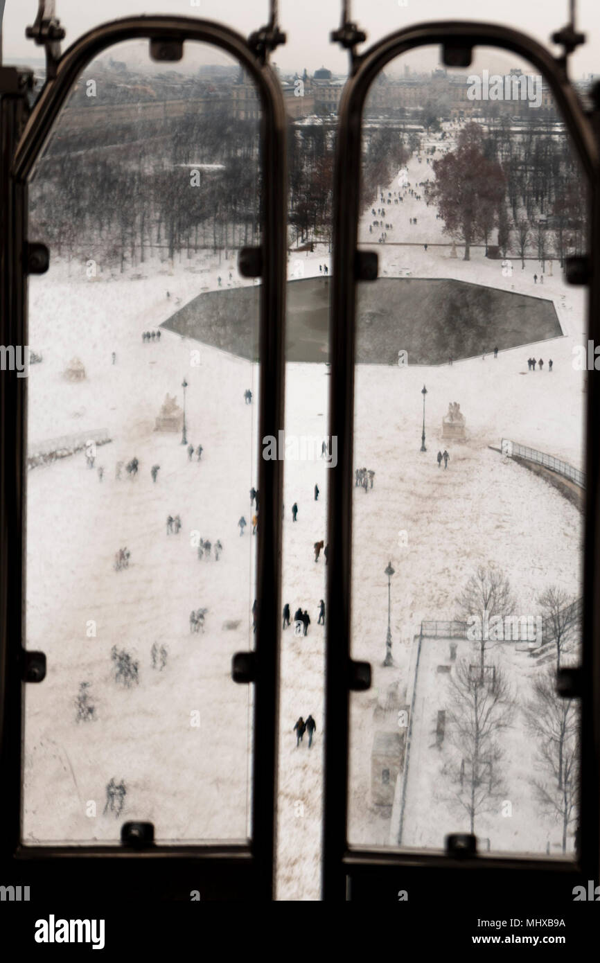 Aerial view of Paris under snow from Place de la concorde wheel Stock Photo