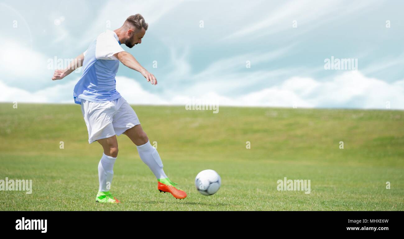 Kicking football hi-res stock photography and images - Alamy