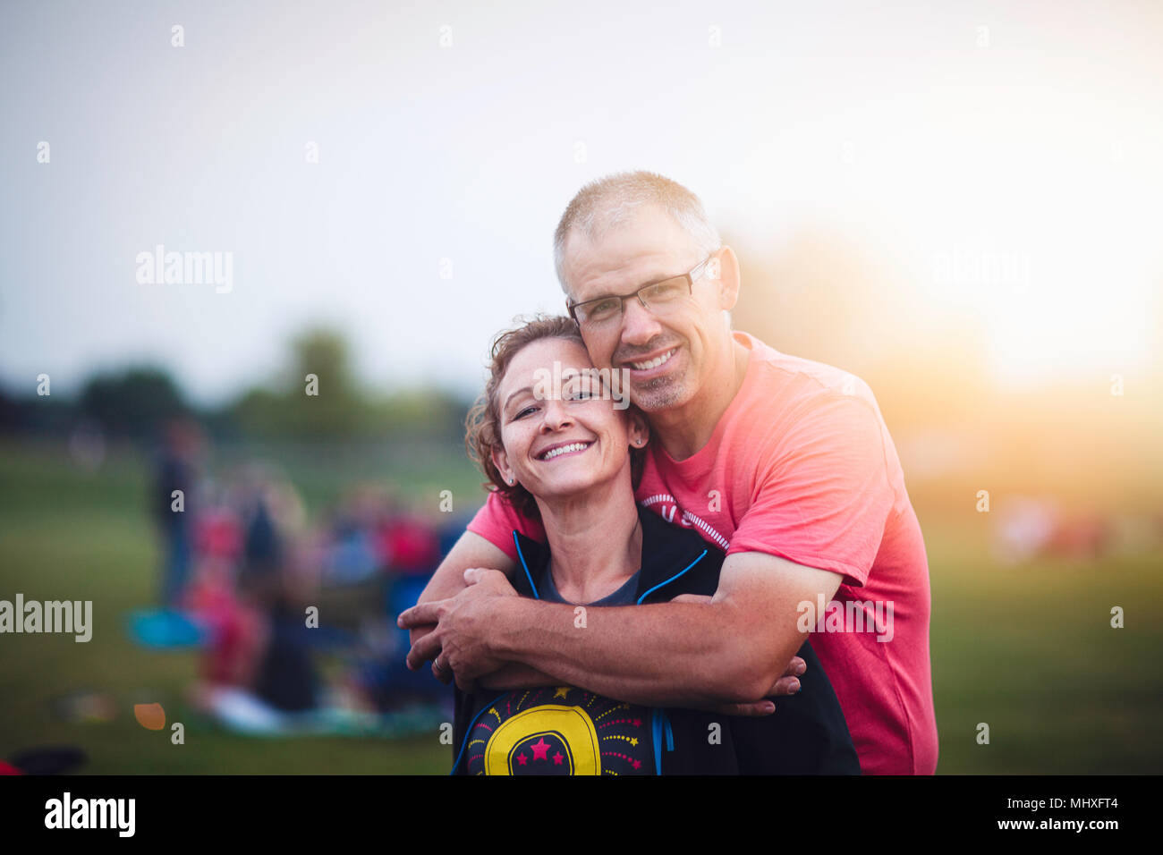 Portrait of couple looking at camera smiling Stock Photo