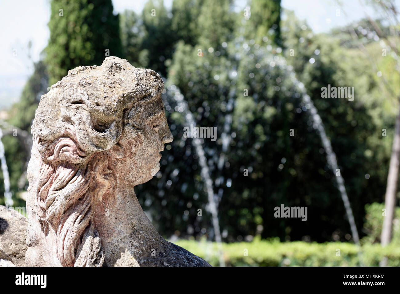 Female figure water sprout, Villa D’Este, Tivoli, Italy. Villa D’Este, renowned for its spectacular use of water, represents the quintessence of the I Stock Photo