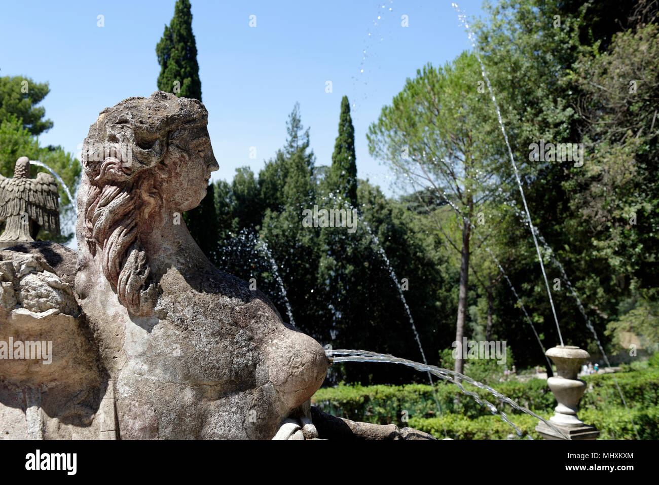 Female figure water sprout, Villa D’Este, Tivoli, Italy. Villa D’Este, renowned for its spectacular use of water, represents the quintessence of the I Stock Photo