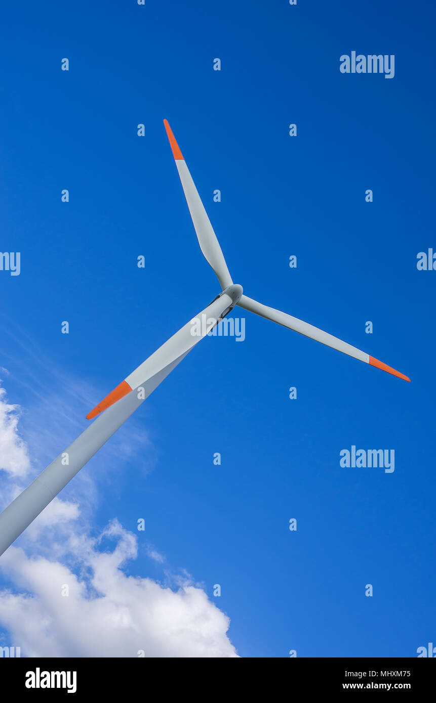 A wind turbine is a wind-powered electrical generator. Stock Photo