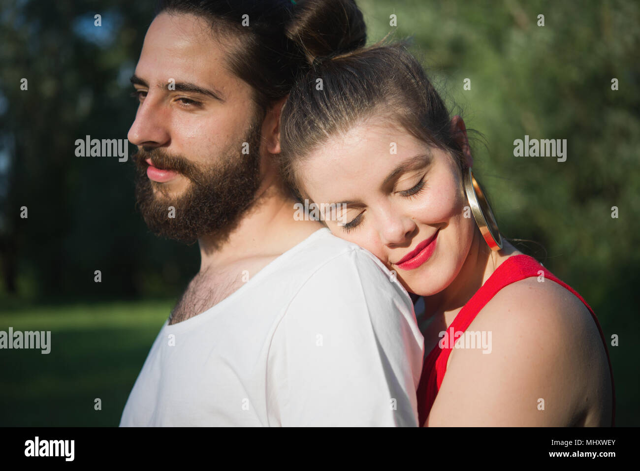 Loving couple in garden Stock Photo