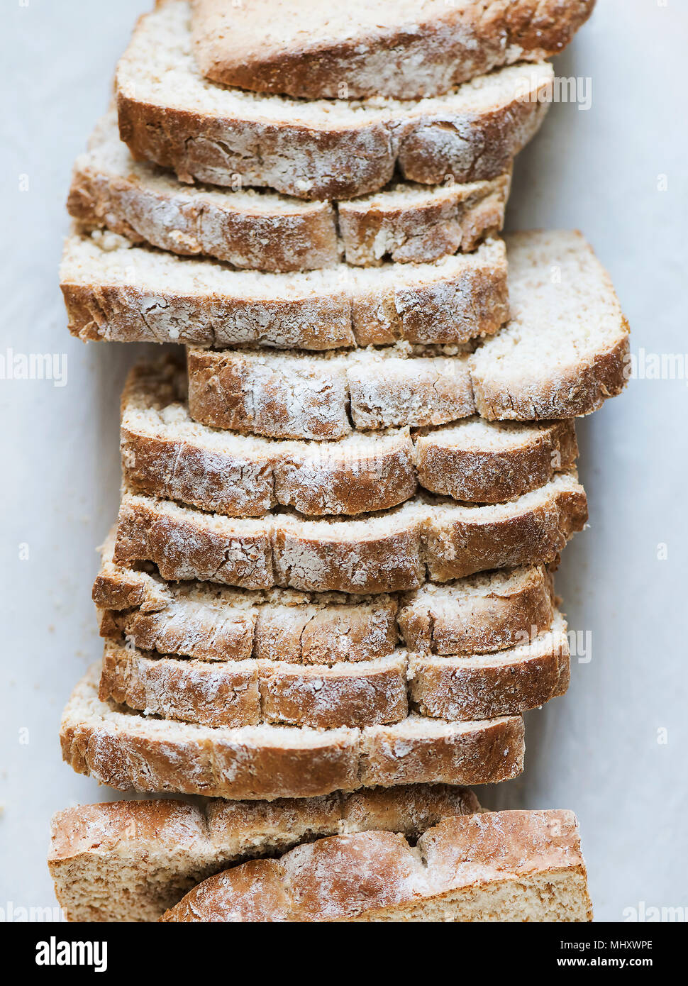 Freshly baked whole grain bread slices Stock Photo