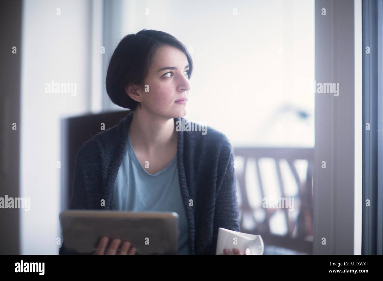Young woman using digital tablet Stock Photo