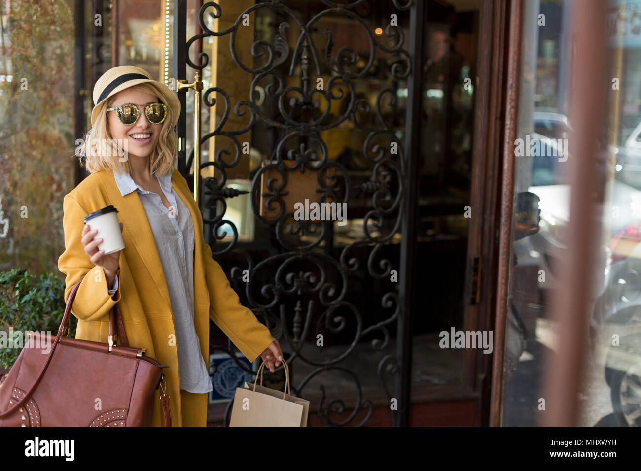 Woman entering restaurant, Cape Town, South Africa Stock Photo