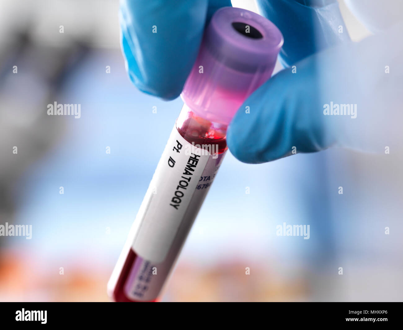 Cropped view of doctor holding vial of blood Stock Photo