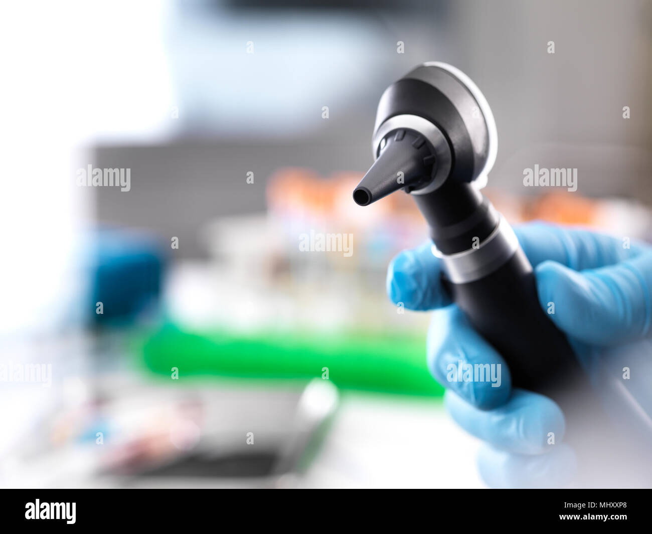 Cropped view of doctor holding otoscope Stock Photo