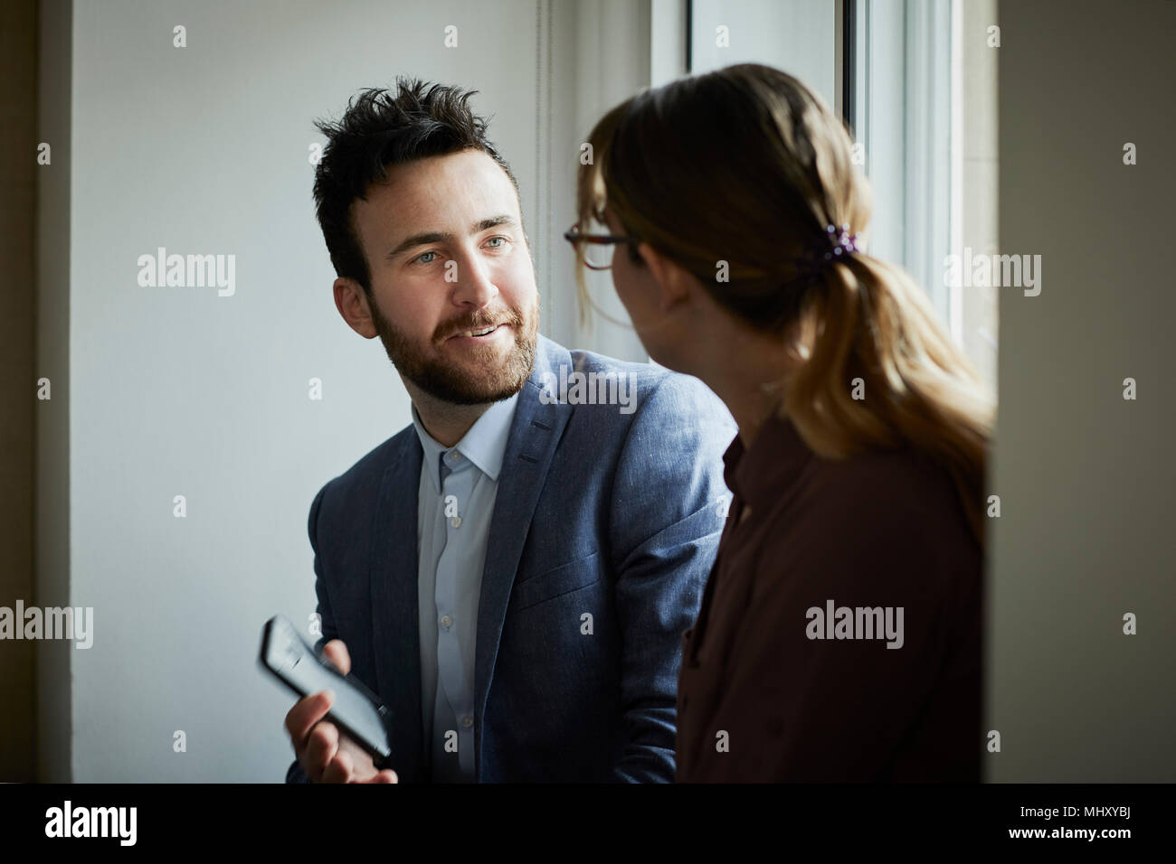 Colleagues talking Stock Photo