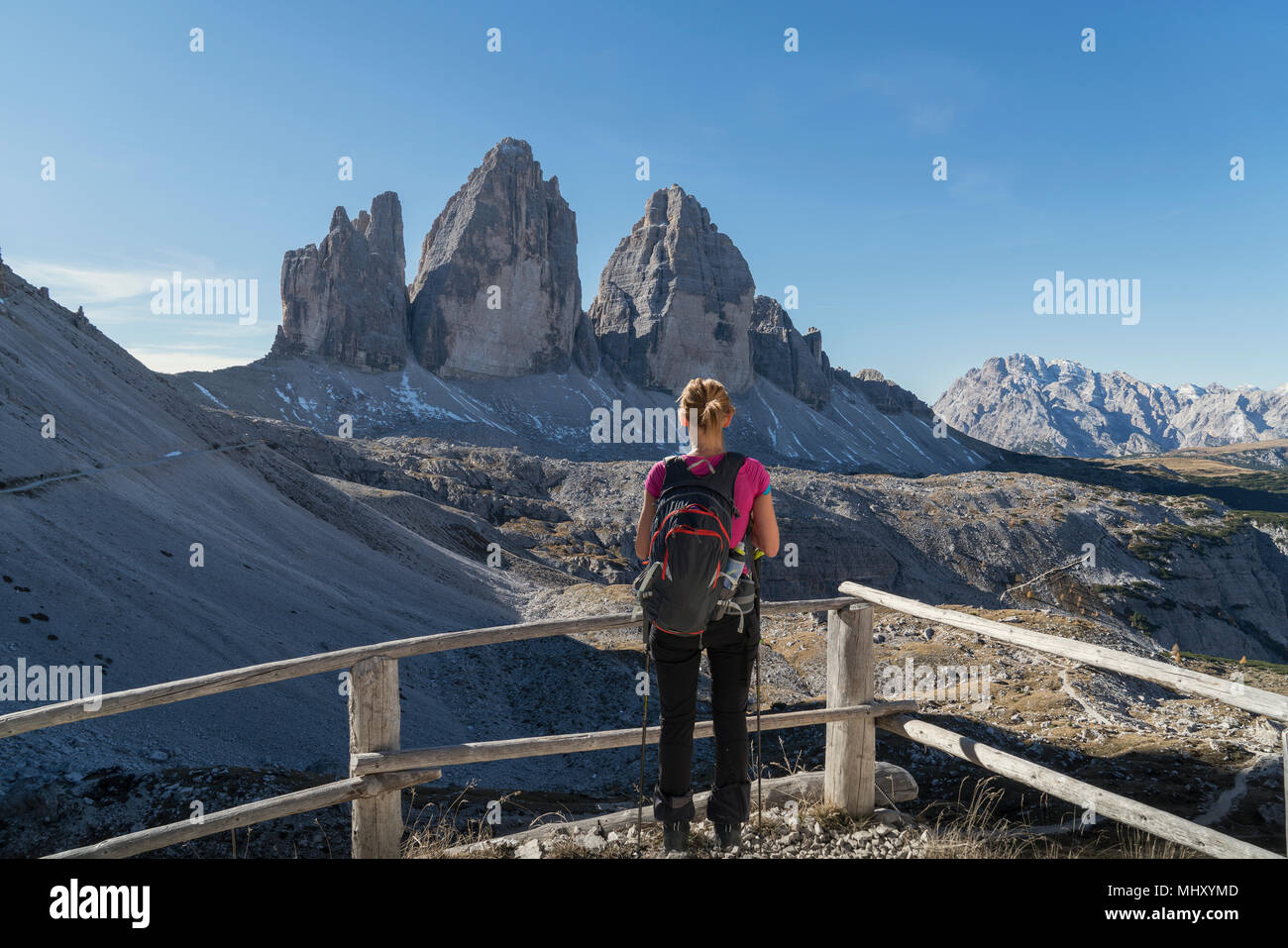 Hiker enjoying view, Dolomites near Cortina d'Ampezzo, Veneto, Italy Stock Photo