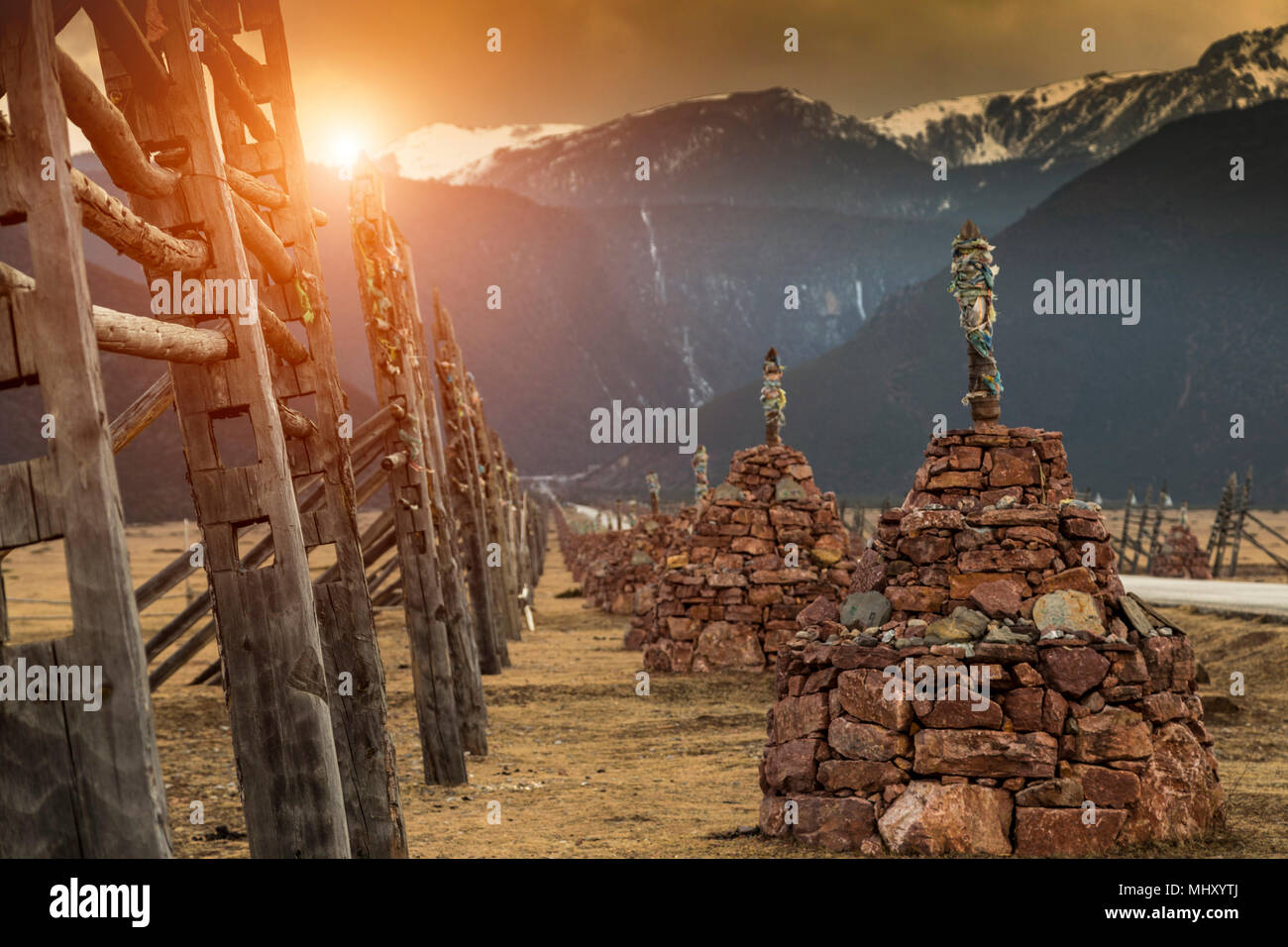 Religious structures, mountains in background, Shangri-La County, Yunnan, China Stock Photo