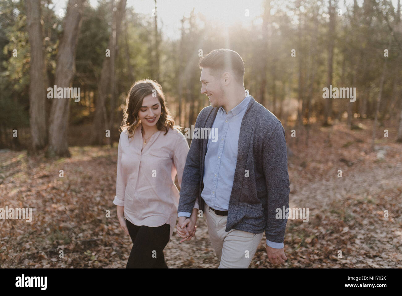 Couple holding hands walking hi-res stock photography and images - Alamy