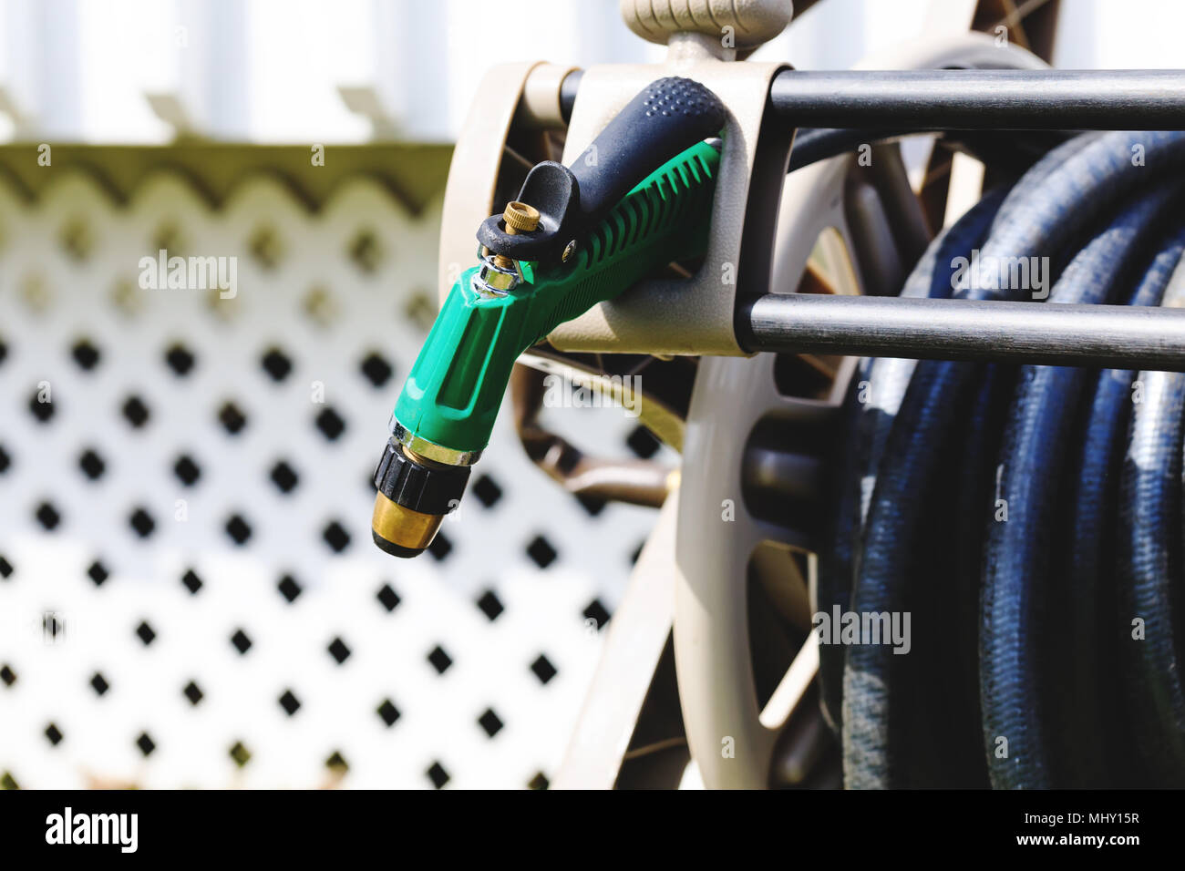 Watering garden equipment, garden hose storage and Pistol Nozzle