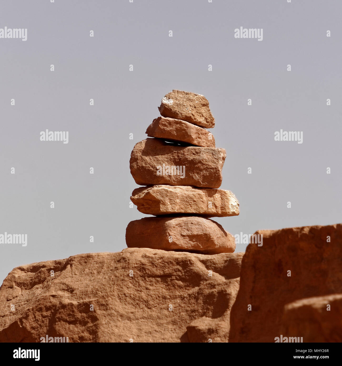 Signpost built by Bedouins and guides from stacked stones in the desert of the Wadi Rum Nature Reserve, Jordan, middle east Stock Photo