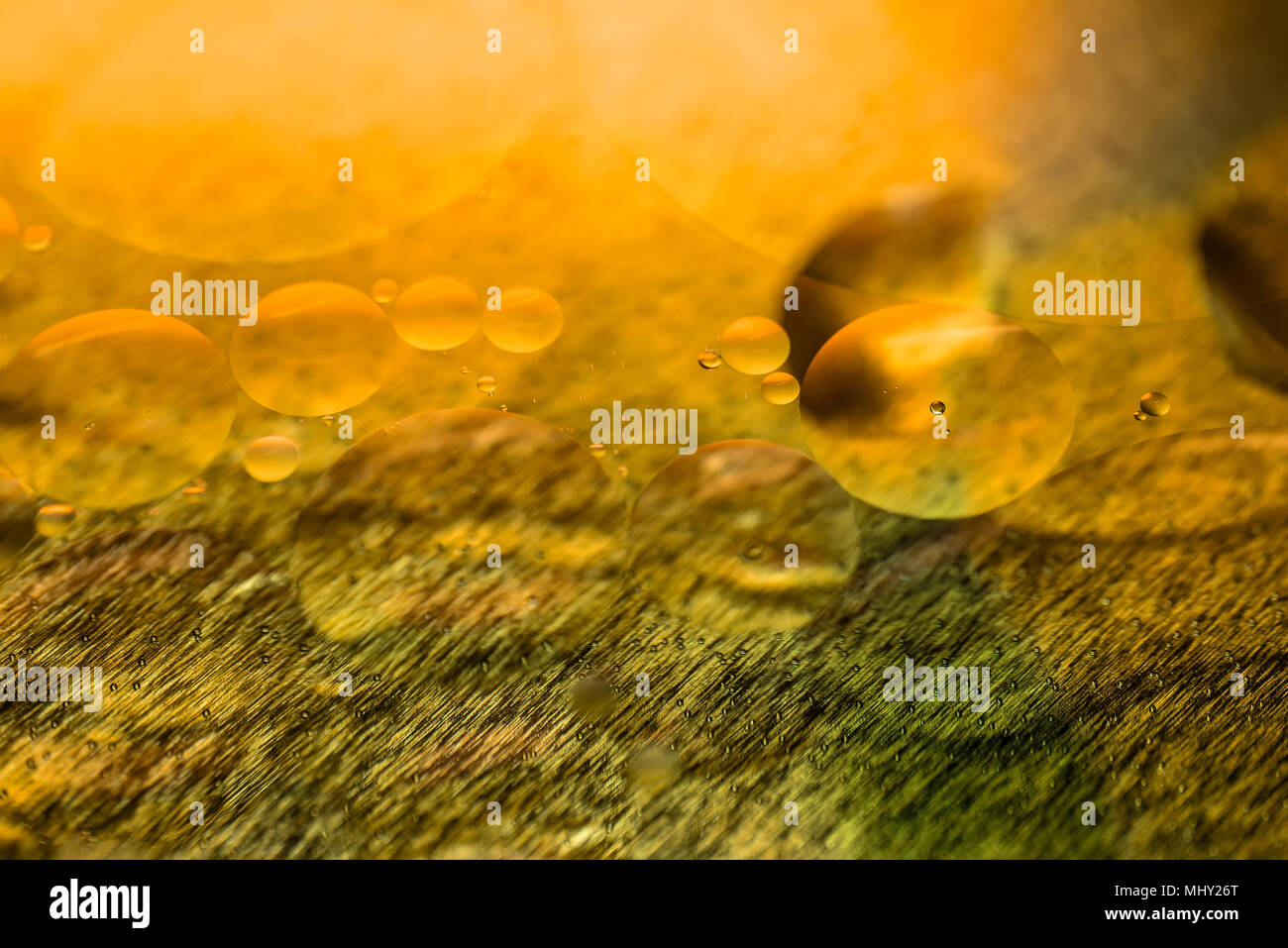 Oil drops and bubbles on a metal gear engine surface. Closeup photo Stock Photo Alamy