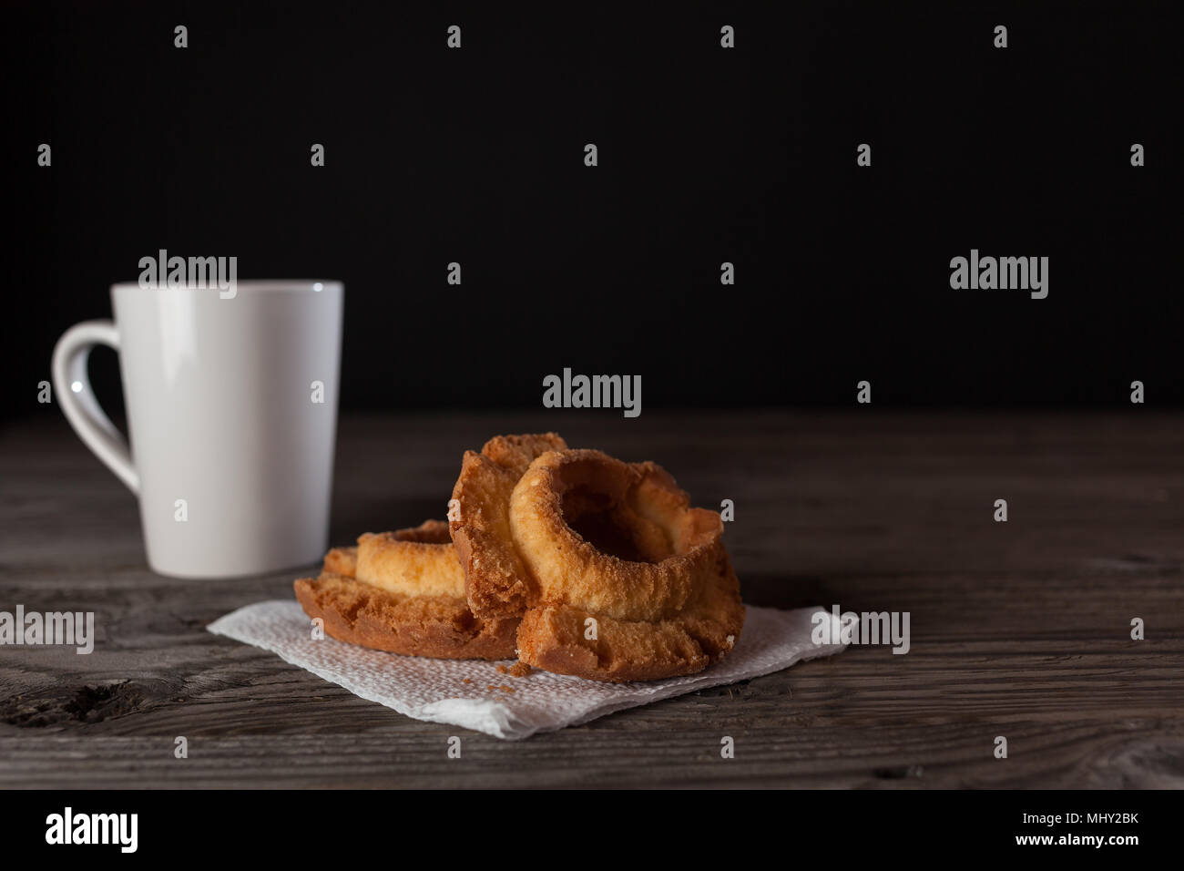 donuts of various size color and shape.  copy space in frame. Stock Photo