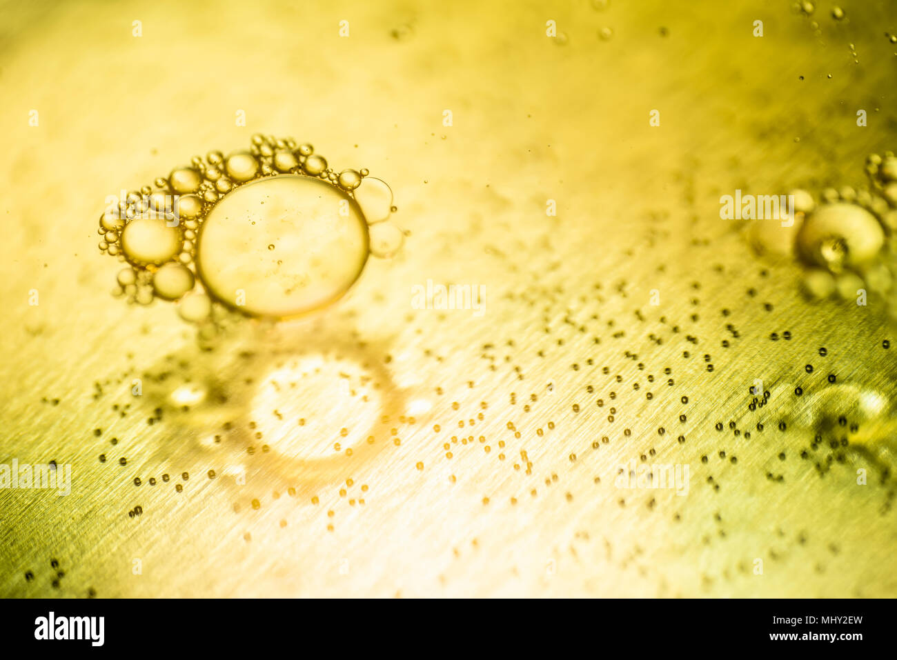 Oil drops and bubbles on a metal gear engine surface. Closeup photo Stock Photo Alamy