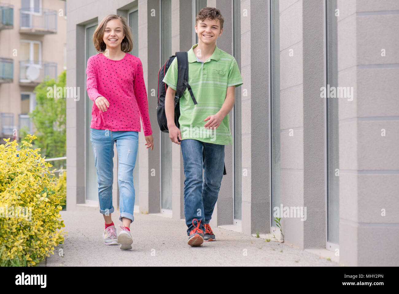 Teen boy girl walk hi-res stock photography and images - Alamy