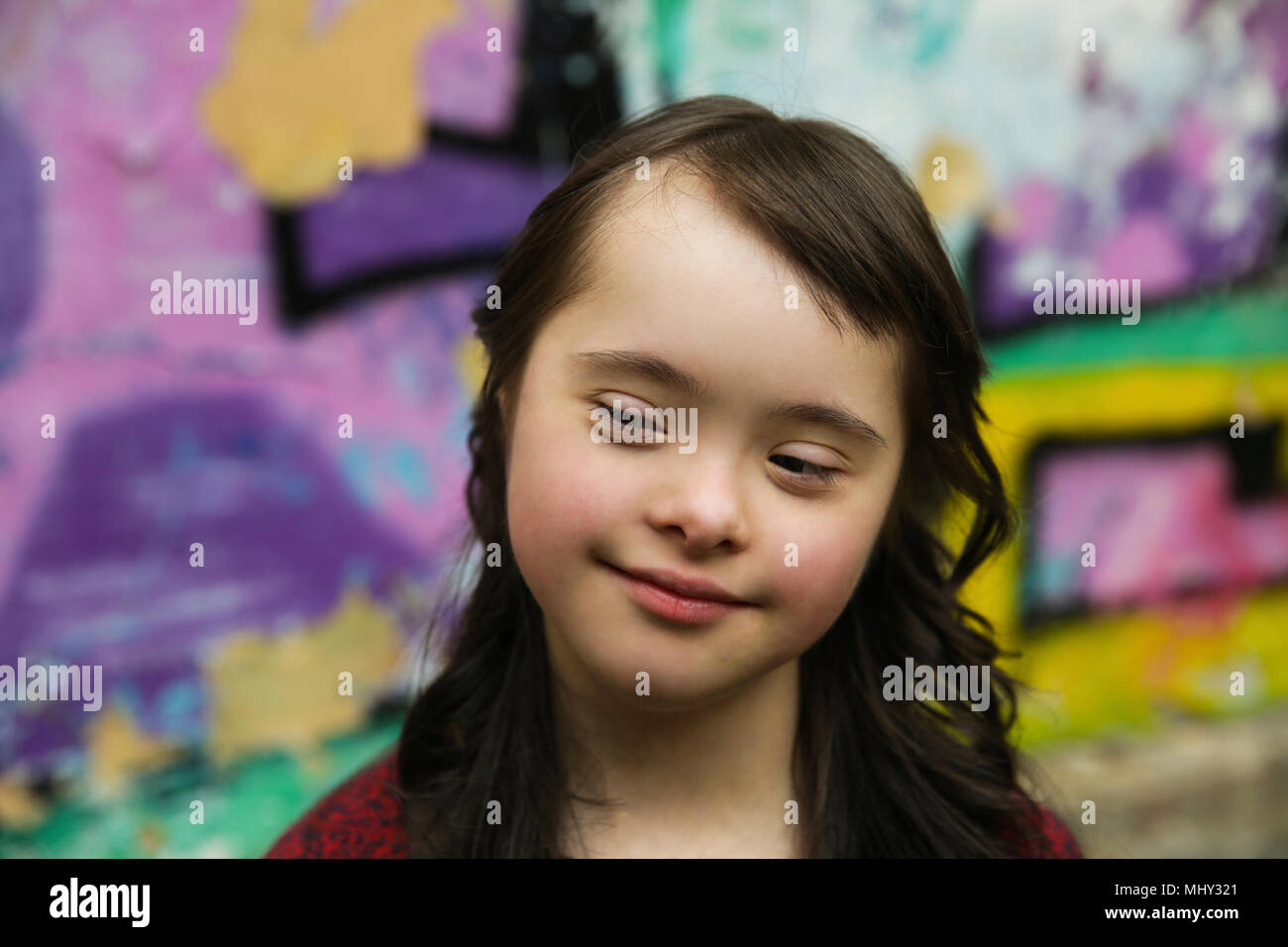 Portrait of little girl smiling outdoors Stock Photo - Alamy