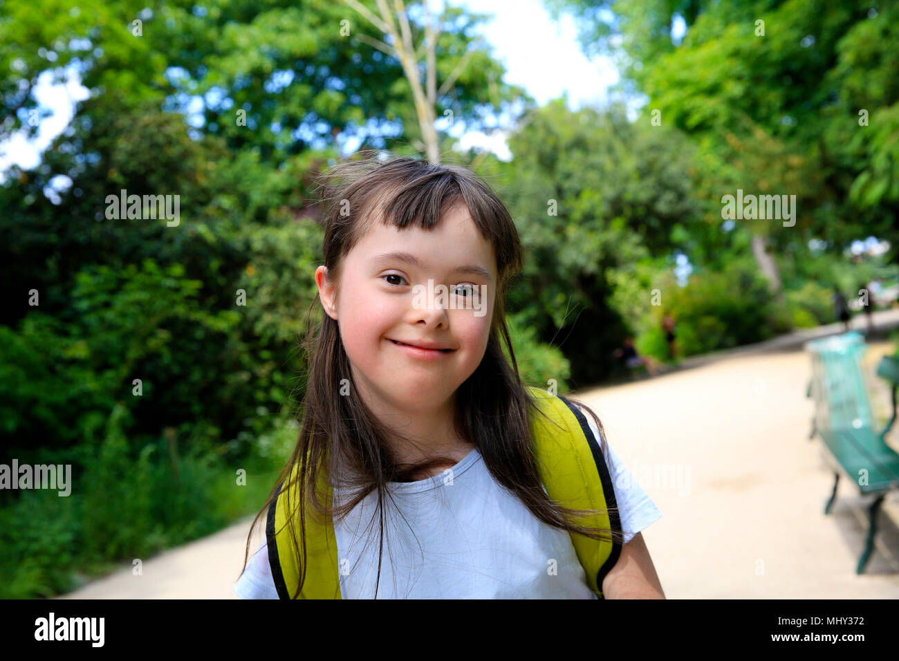 Portrait of little girl smiling in the park Stock Photo - Alamy