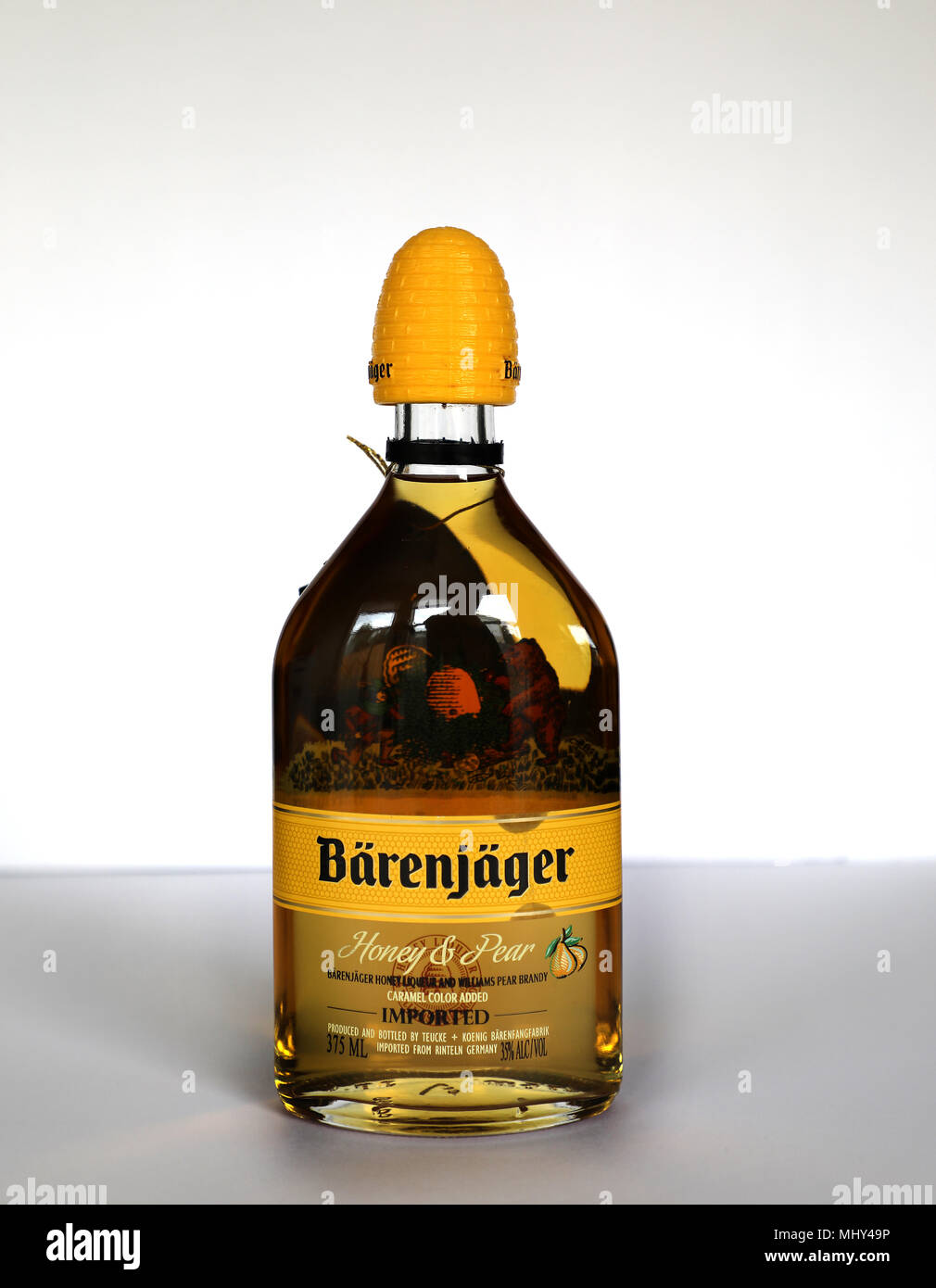 Barenjager Honey and Pear Brandy Liqueur Product of Germany Alcohol Bottle on White Background Stock Photo