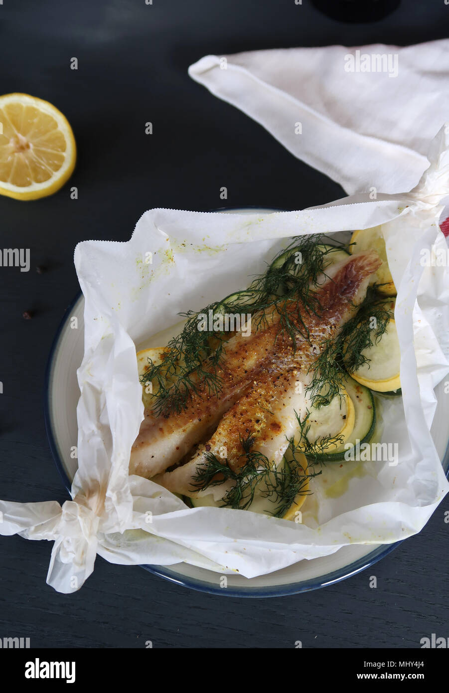 Fish En Papillote Fish baked in Parchment Paper Stock Photo Alamy