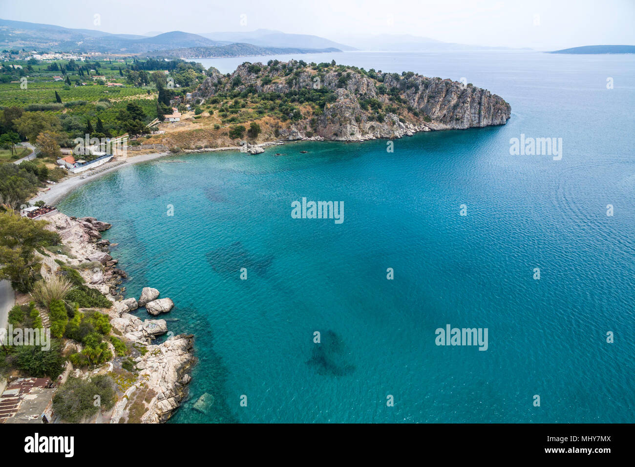Panoramic drone view of  the beach at Greek town of Tolo Stock Photo