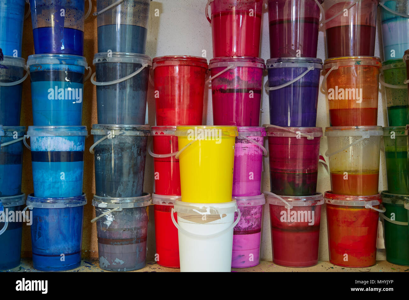 Colorful ink paint bottles in a row stacked in a print factory Stock ...