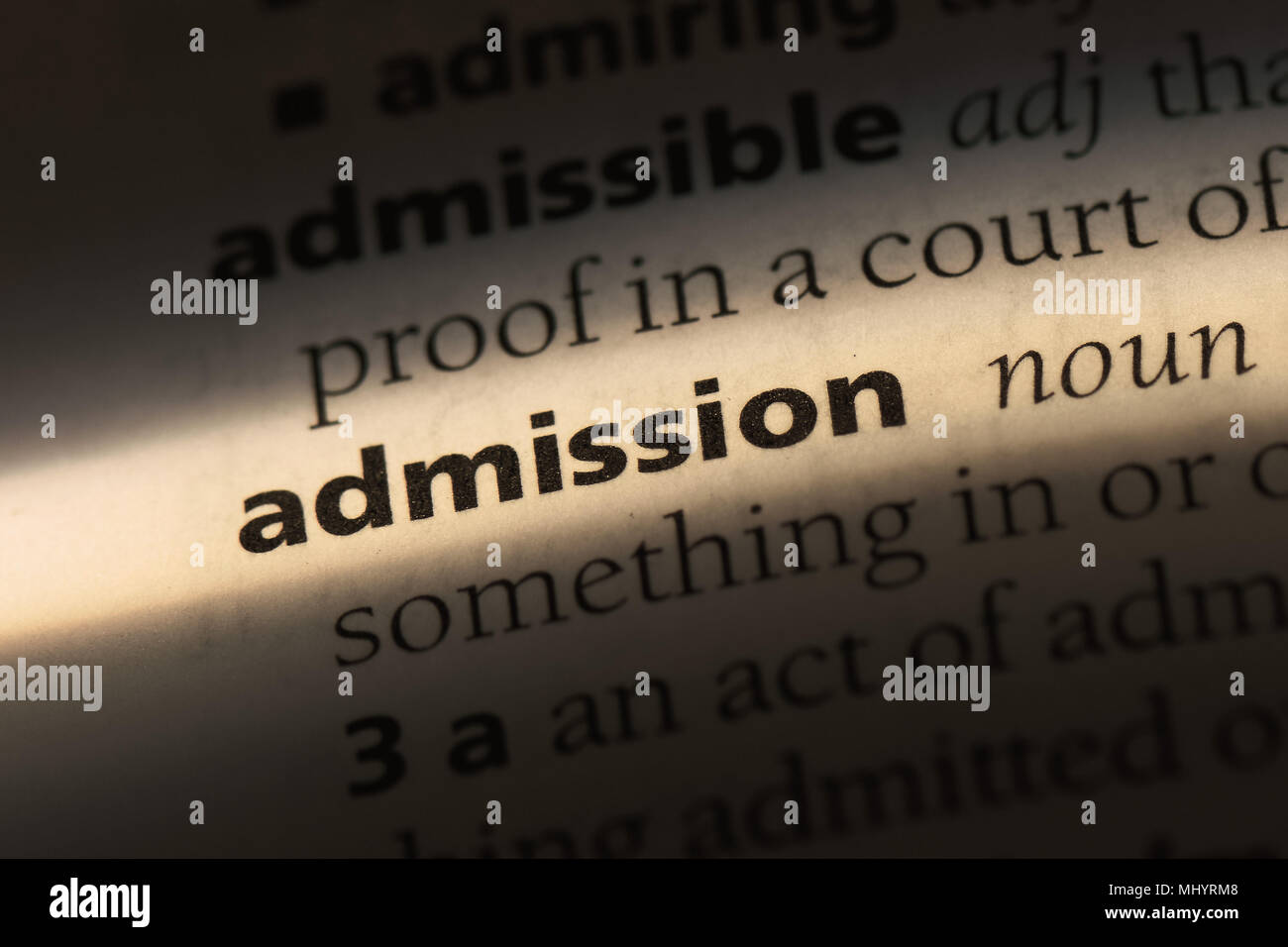 admission word in a dictionary. admission concept. Stock Photo