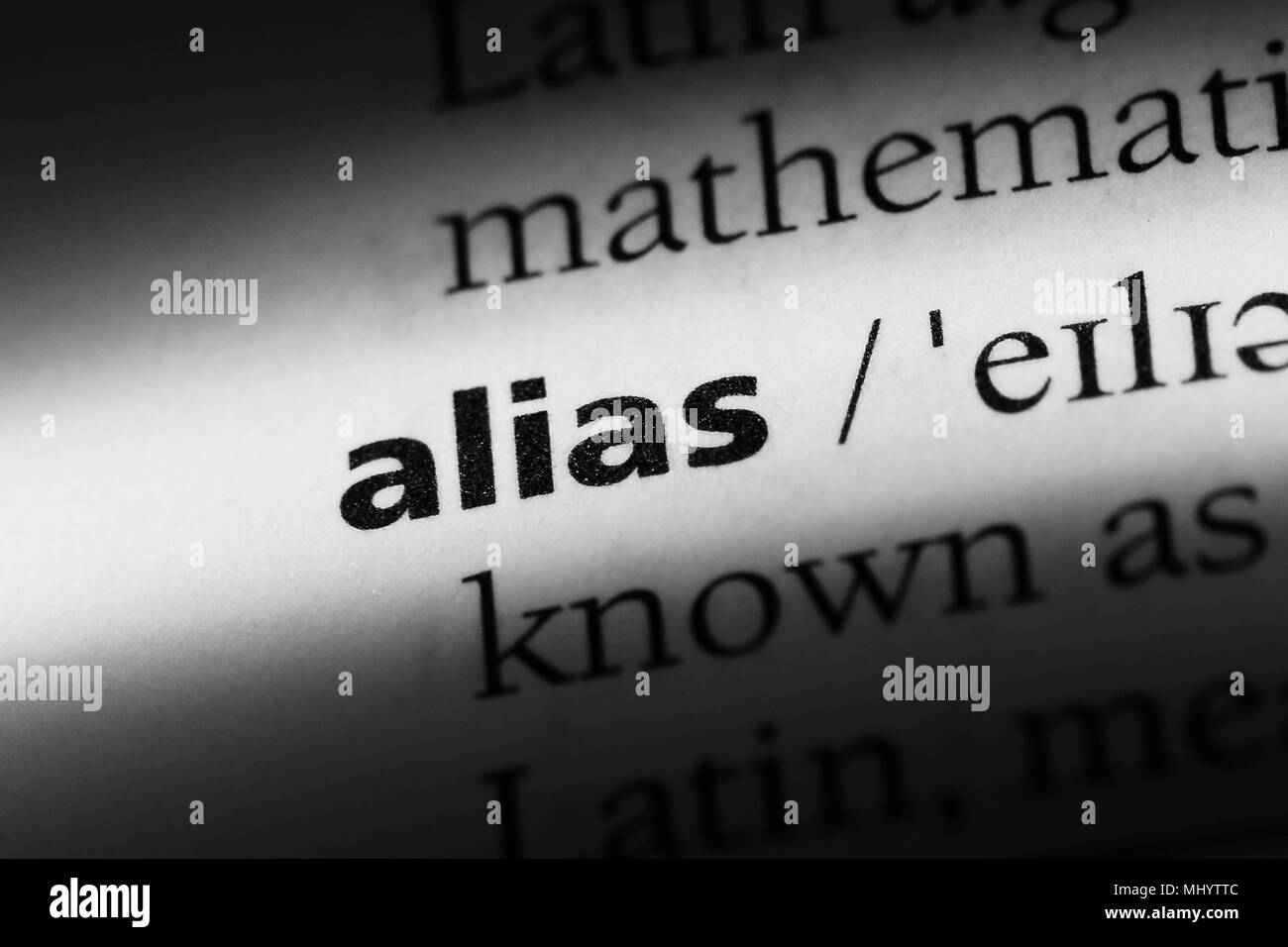 alias word in a dictionary. alias concept Stock Photo - Alamy