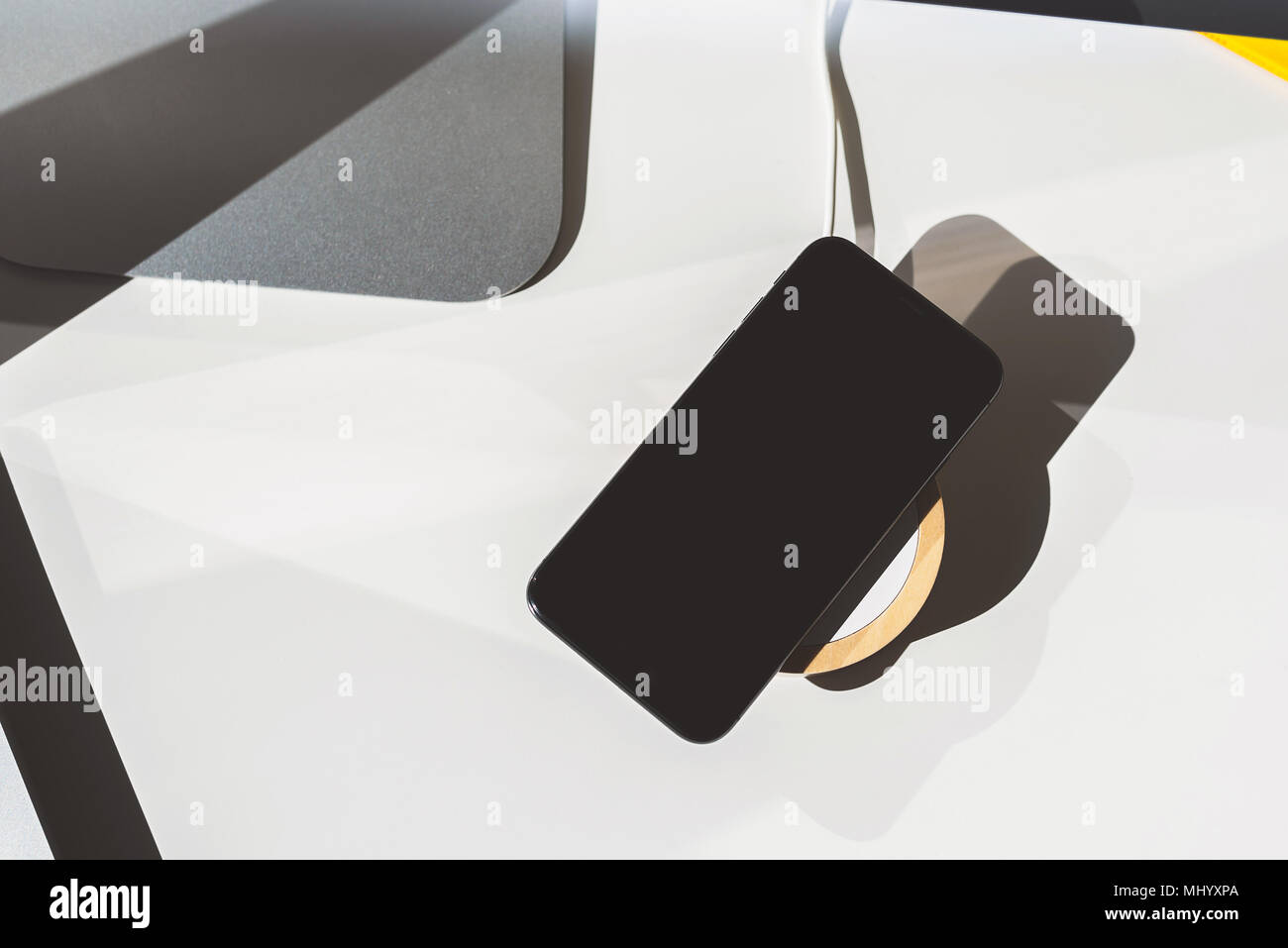 Mobile placed on wireless charger. Future technology concept Stock Photo