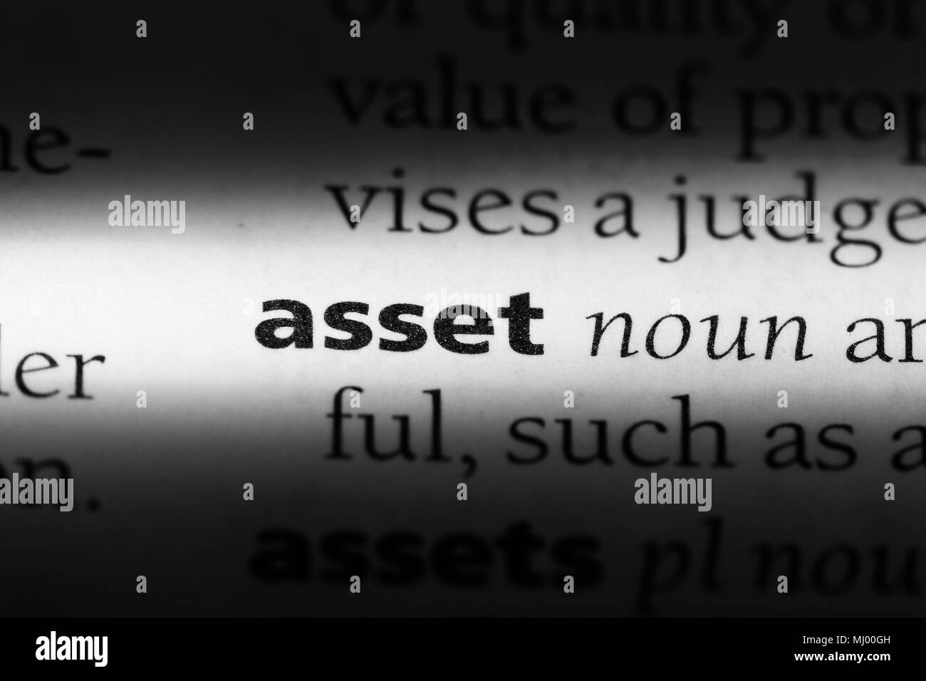 asset word in a dictionary. asset concept Stock Photo - Alamy