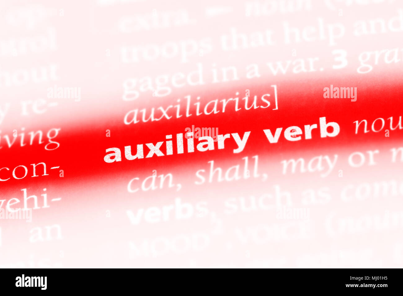 auxiliary verb word in a dictionary. auxiliary verb concept Stock Photo