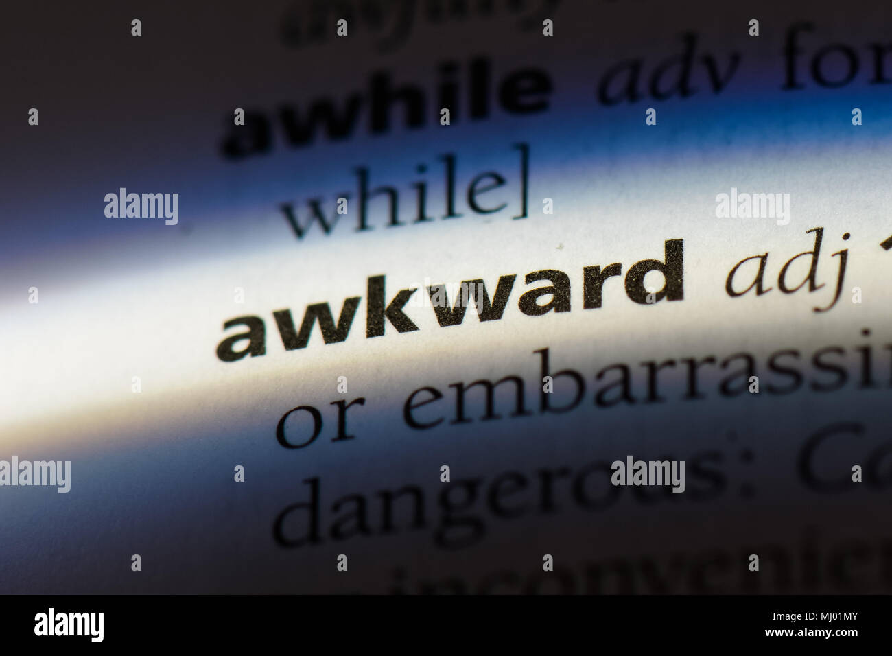 awkward word in a dictionary. awkward concept Stock Photo Alamy