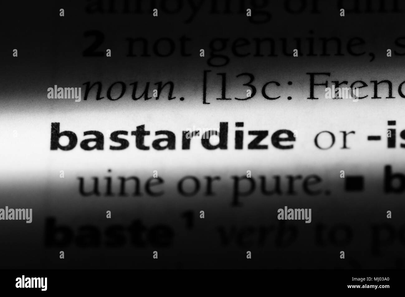 bastardize word in a dictionary. bastardize concept Stock Photo Alamy