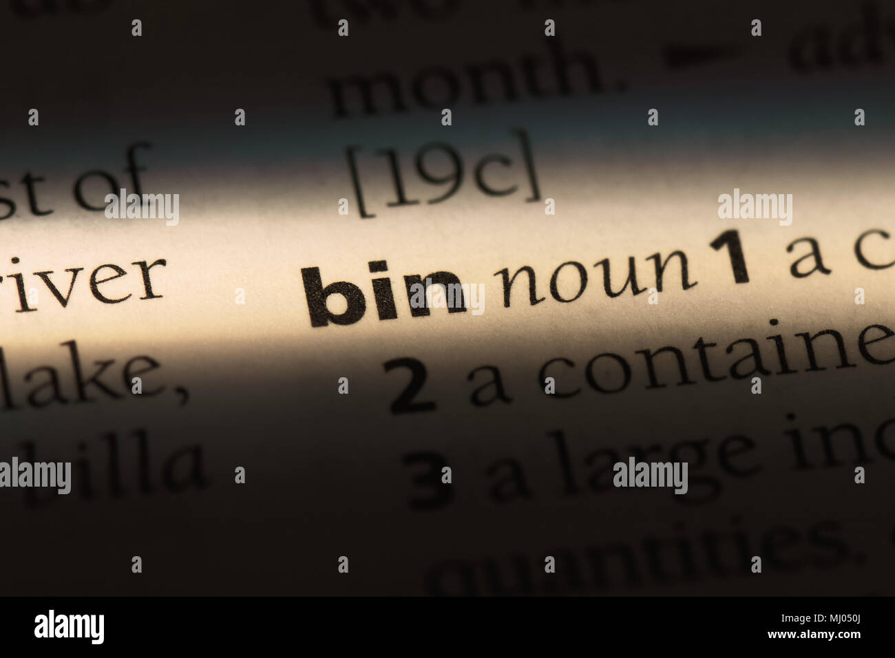 bin word in a dictionary. bin concept Stock Photo Alamy