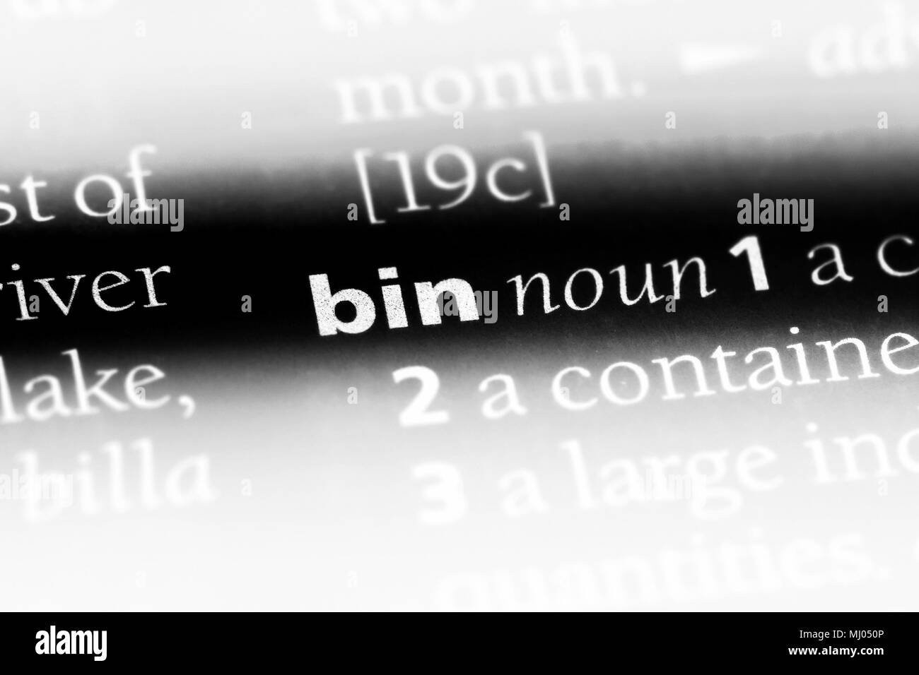 bin word in a dictionary. bin concept Stock Photo Alamy