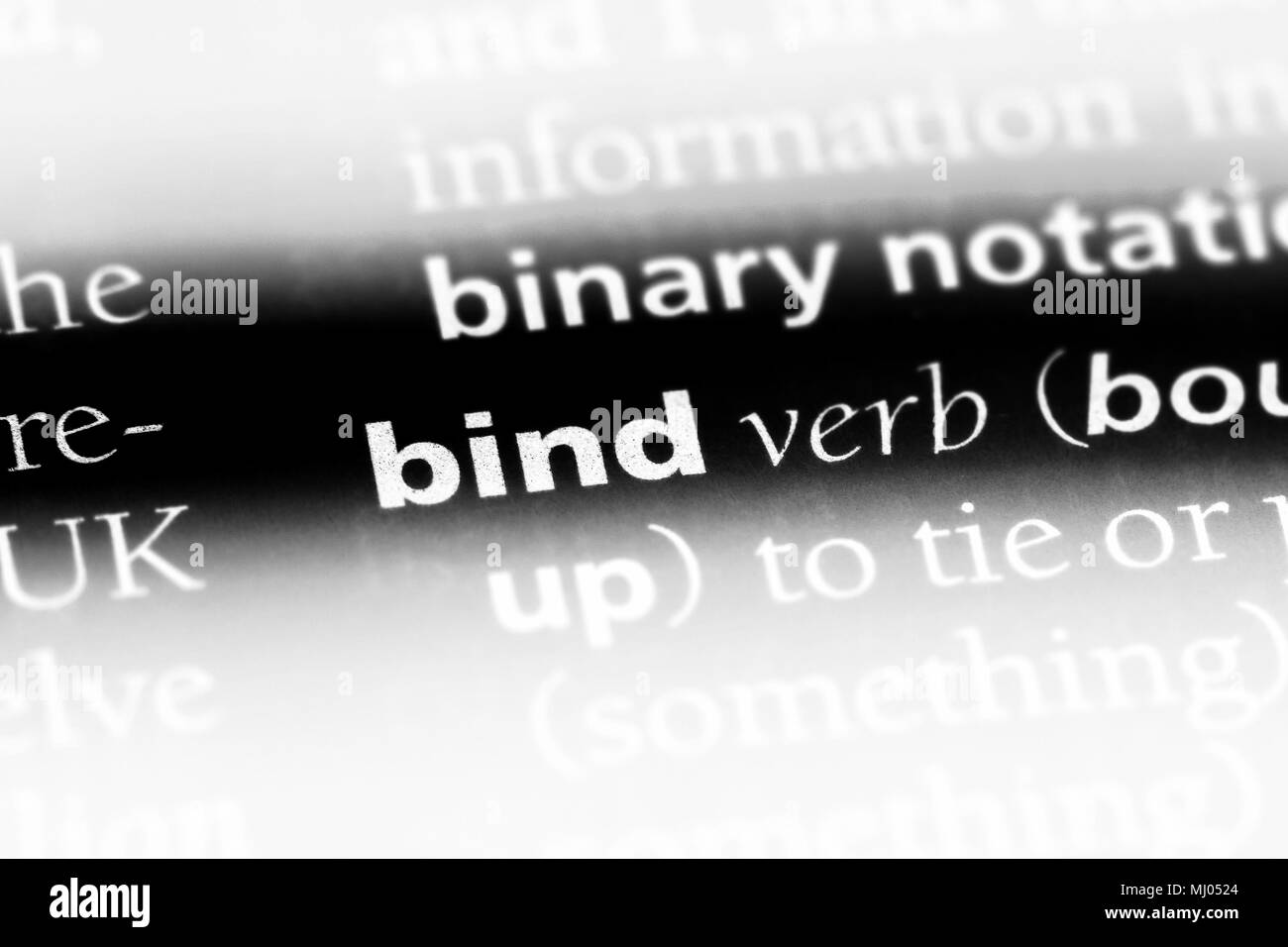 bind word in a dictionary. bind concept Stock Photo - Alamy