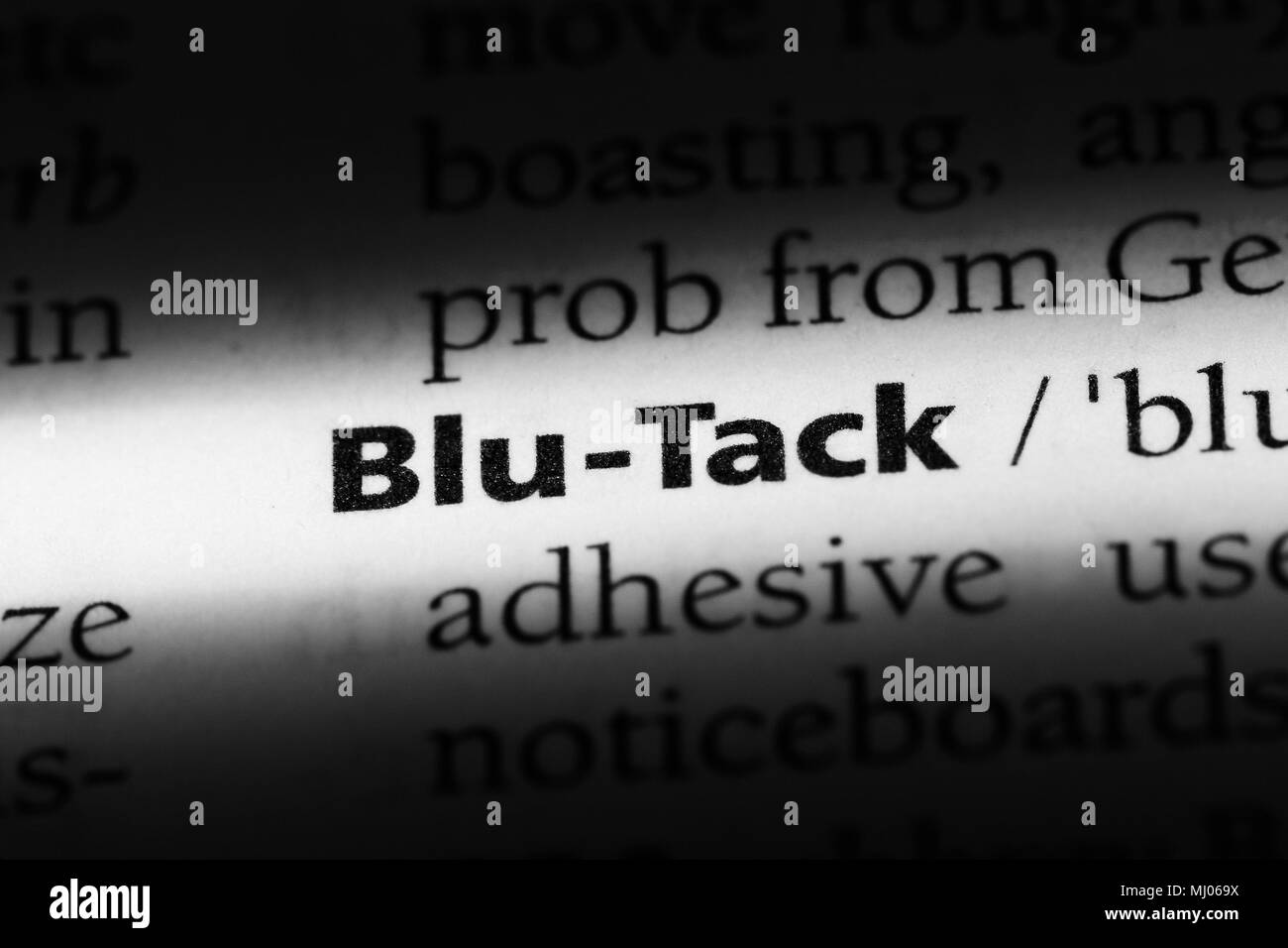 blutack word in a dictionary. blutack concept Stock Photo Alamy